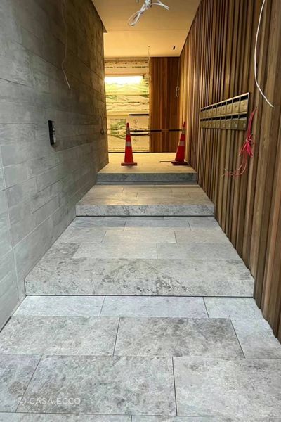 Here, Casa Ecco demonstrates expertise in tiling steps seamlessly.