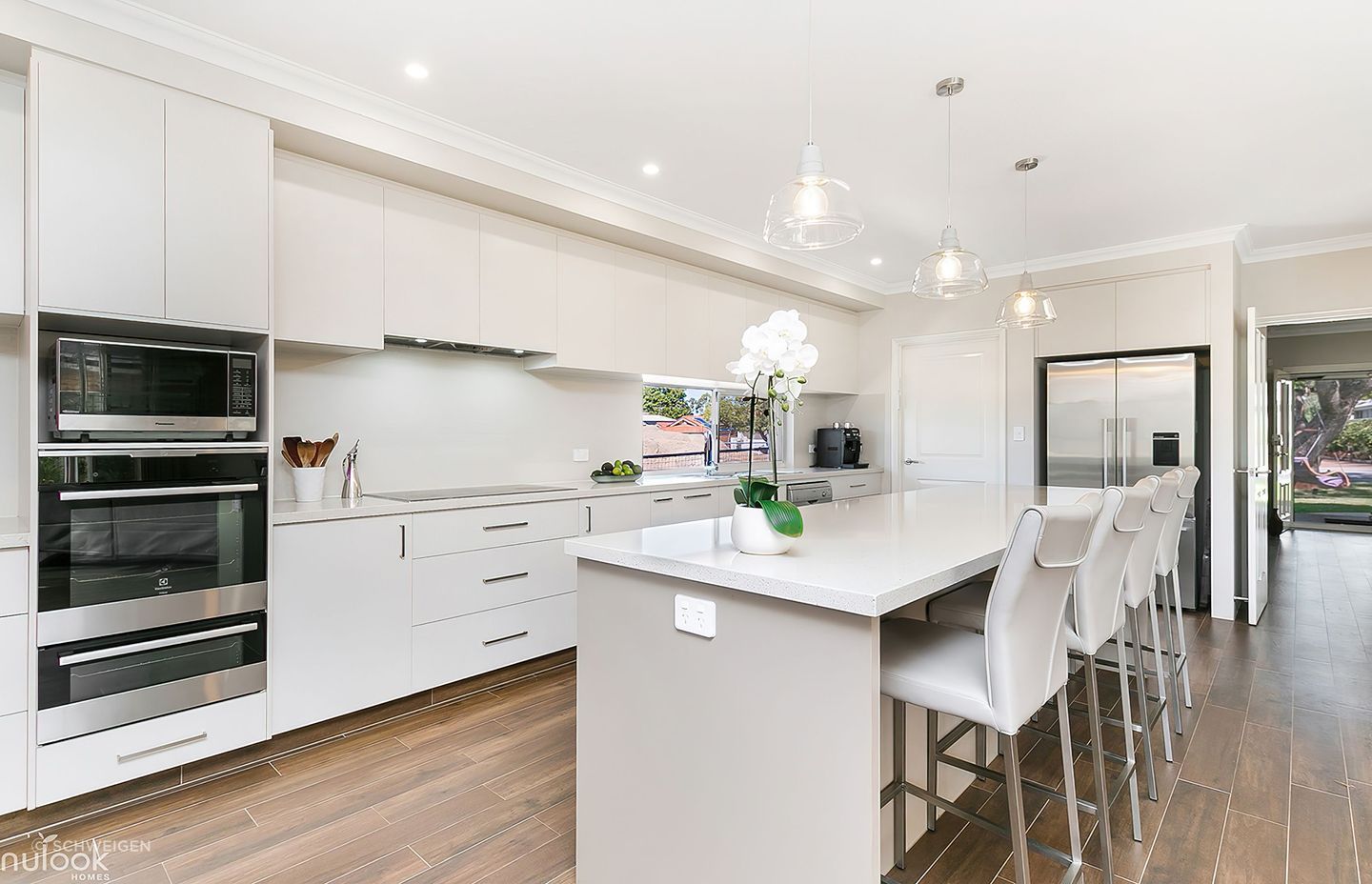 Manning Residence by Nulook Homes featuring the UM1170-9S Schweigen Silent Undermount Rangehood.