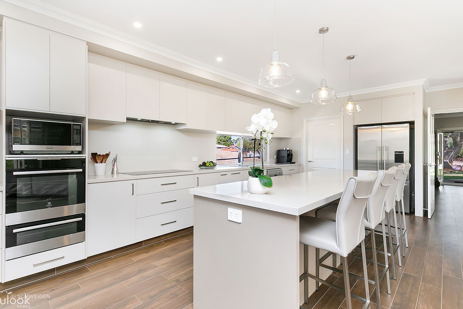 Manning Residence by Nulook Homes featuring the UM1170-9S Schweigen Silent Undermount Rangehood.