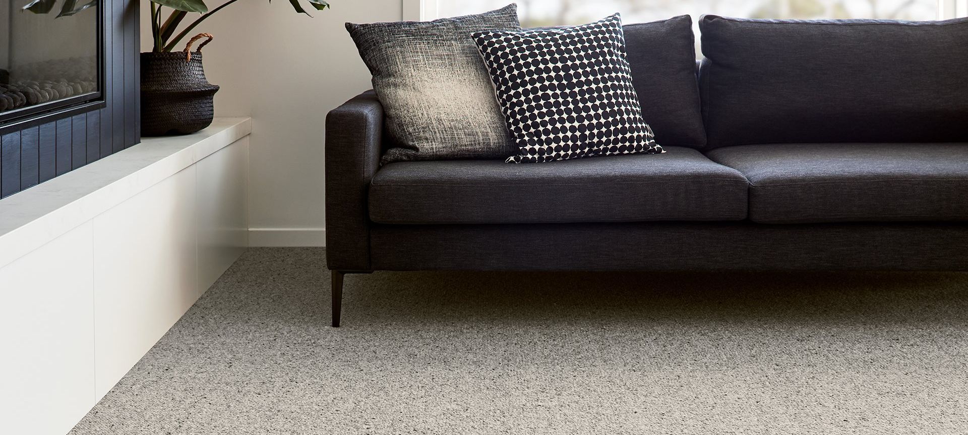What are the pros and cons of wool carpet?
