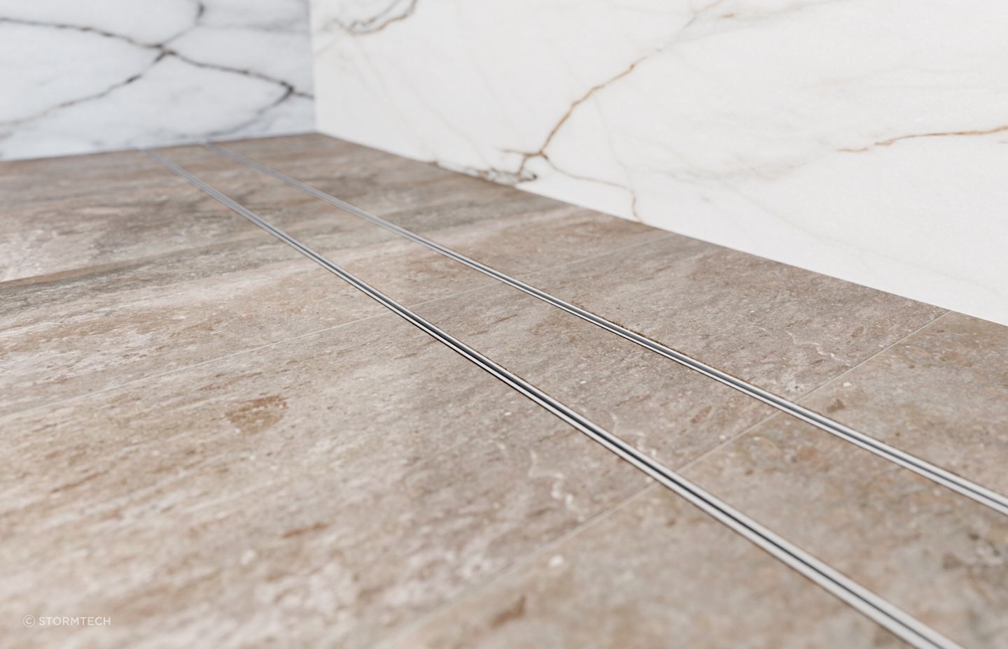 This slimline linear drain from Stormtech allows you to seamlessly lay tiles, flush with the wetroom floor.