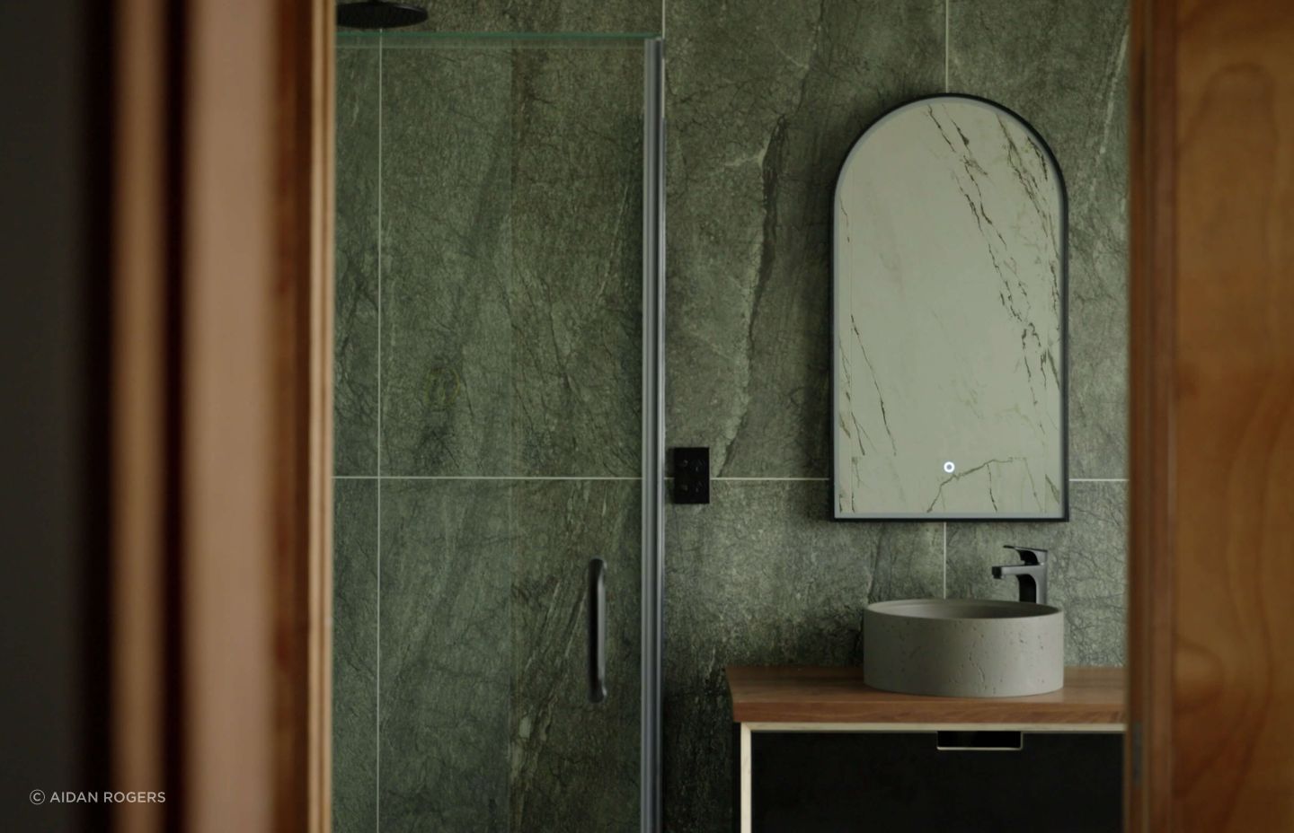 A new, fully tiled bathroom elevates this home renovation to the next level.