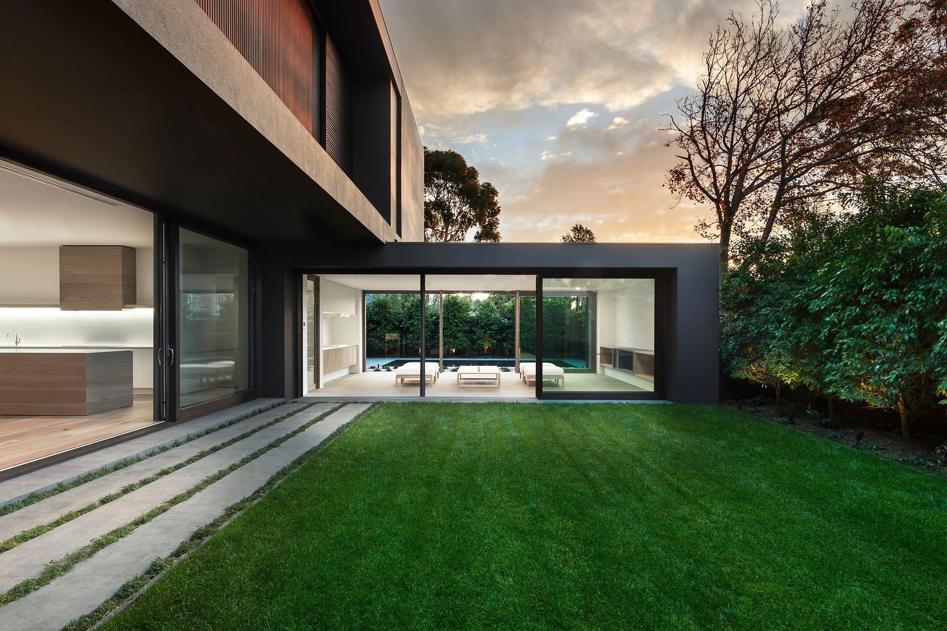 At Bay St, a restrained material palette and carefully controlled openings transform an exposed site into a calm, north-facing refuge. | Photo Credit: John Wheatley