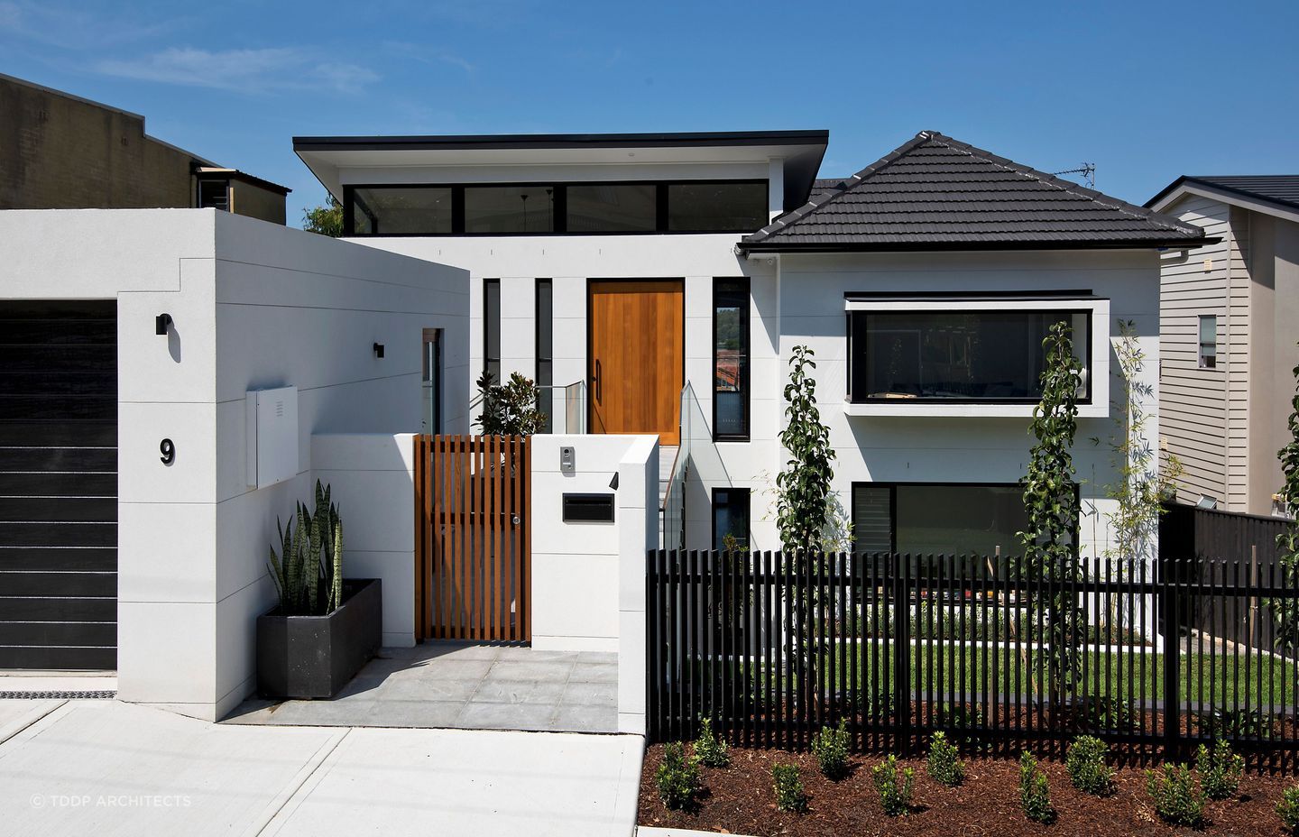 A stylish front gate helps keep your home safe, while increasing its kerb appeal. Featured project: 9L by TDDP Architects