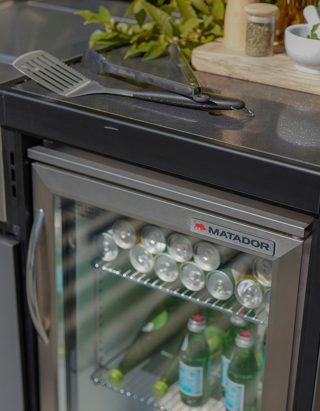 A sophisticated bar fridge is a must for any outdoor kitchen