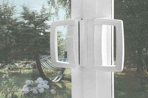 Aria D pull handles in white from ASSA ABLOY.