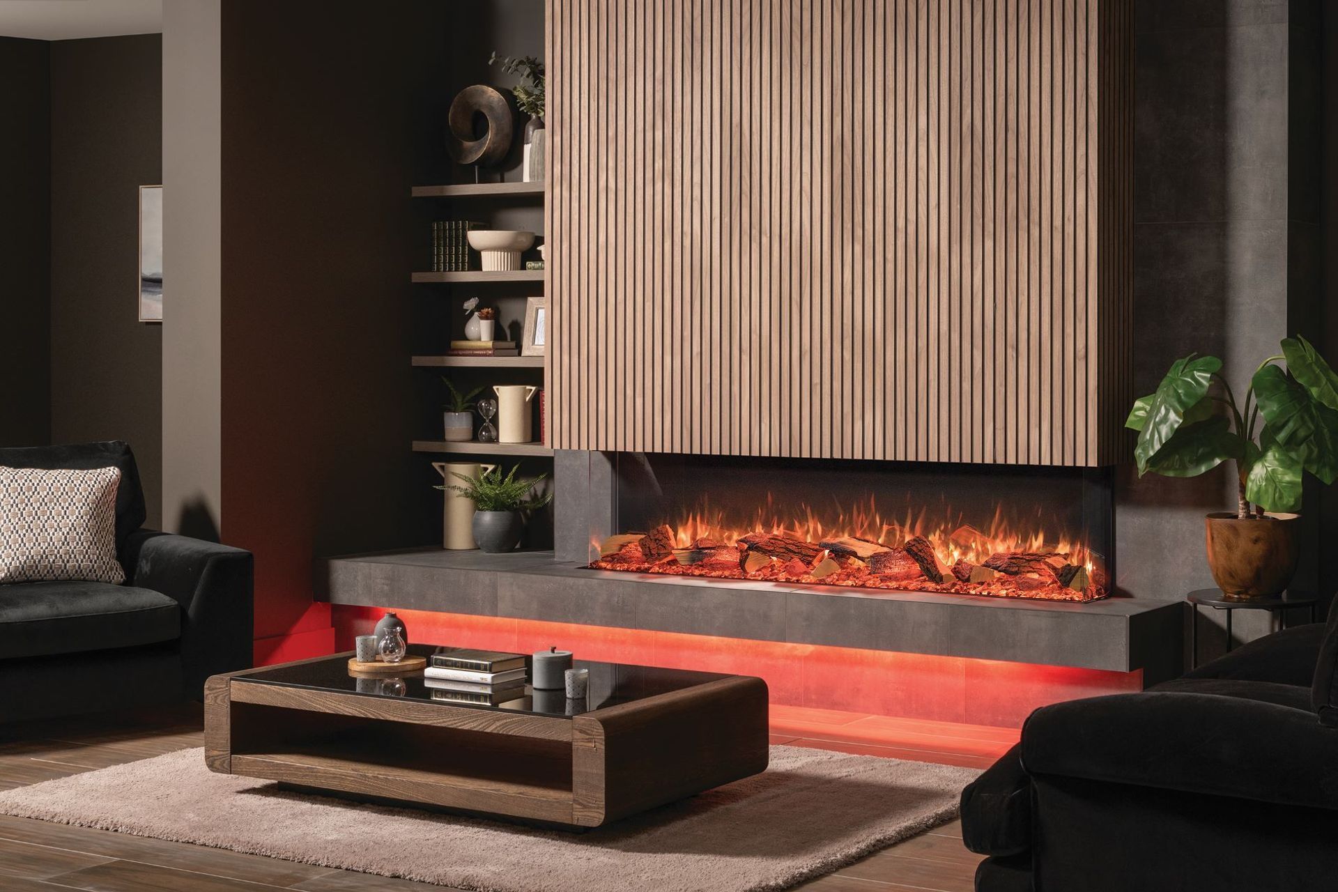 A fireplace, like this sophisticated Onyx Avanti Electric Fireplace, is just one way to create a focal point in a living room.