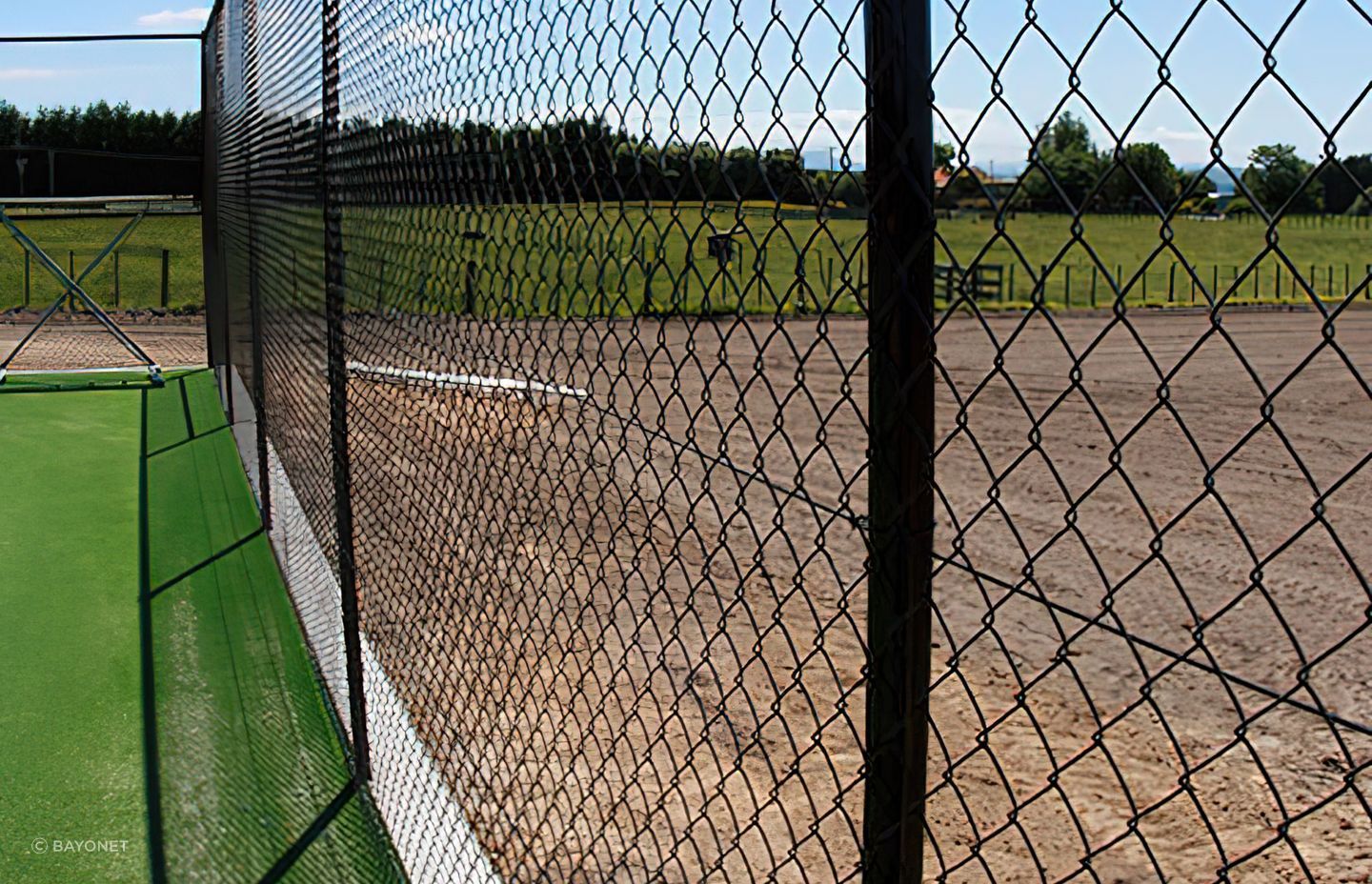 Functional but highly effective, there are plenty of applications for chain link fencing, seen here featuring Bayonet Chain Link Netting.