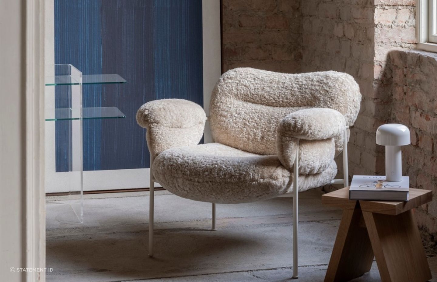 The beautiful Bollo Armchair in Sheepskin is a perfect example of a textural accent chair for a space.