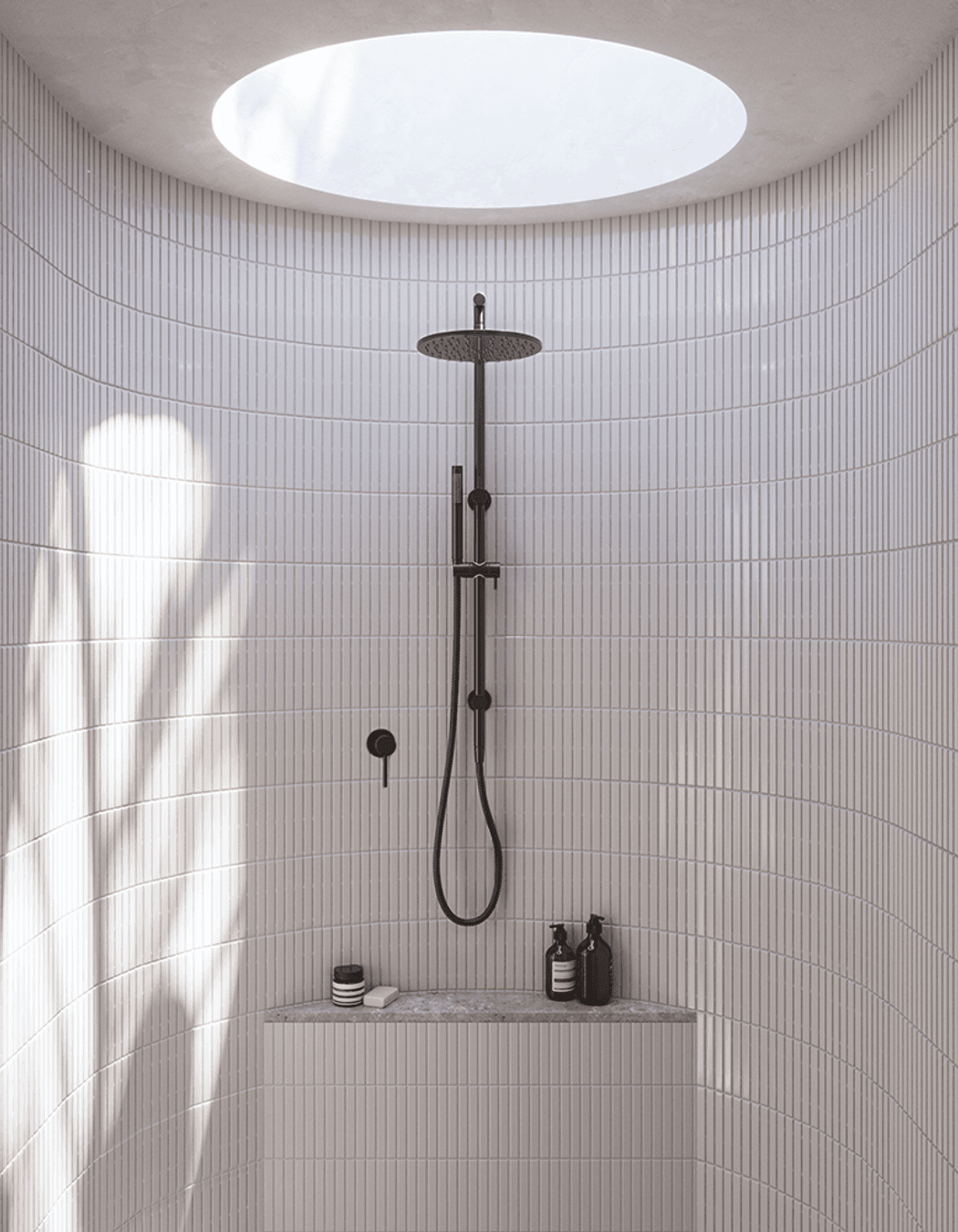 A stunning walk-in shower and a stunning product — the Mira Brushed Gunmetal Shower Rail Twin Set from Buildmat.