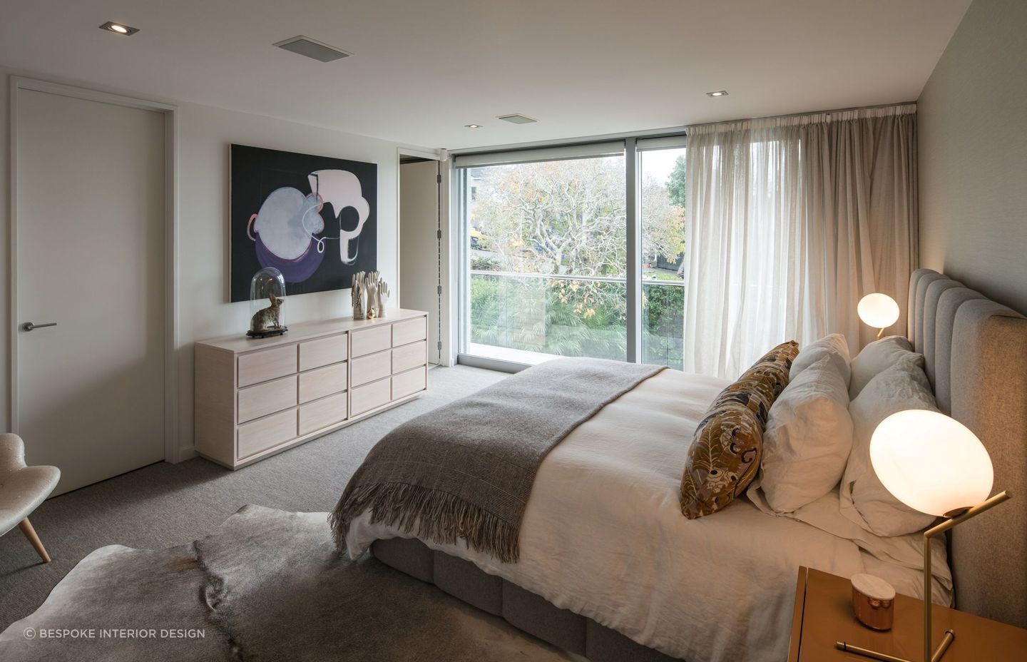 A work of art, like this exquisite abstract piece at Benson House, can quickly set a sophisticated tone.