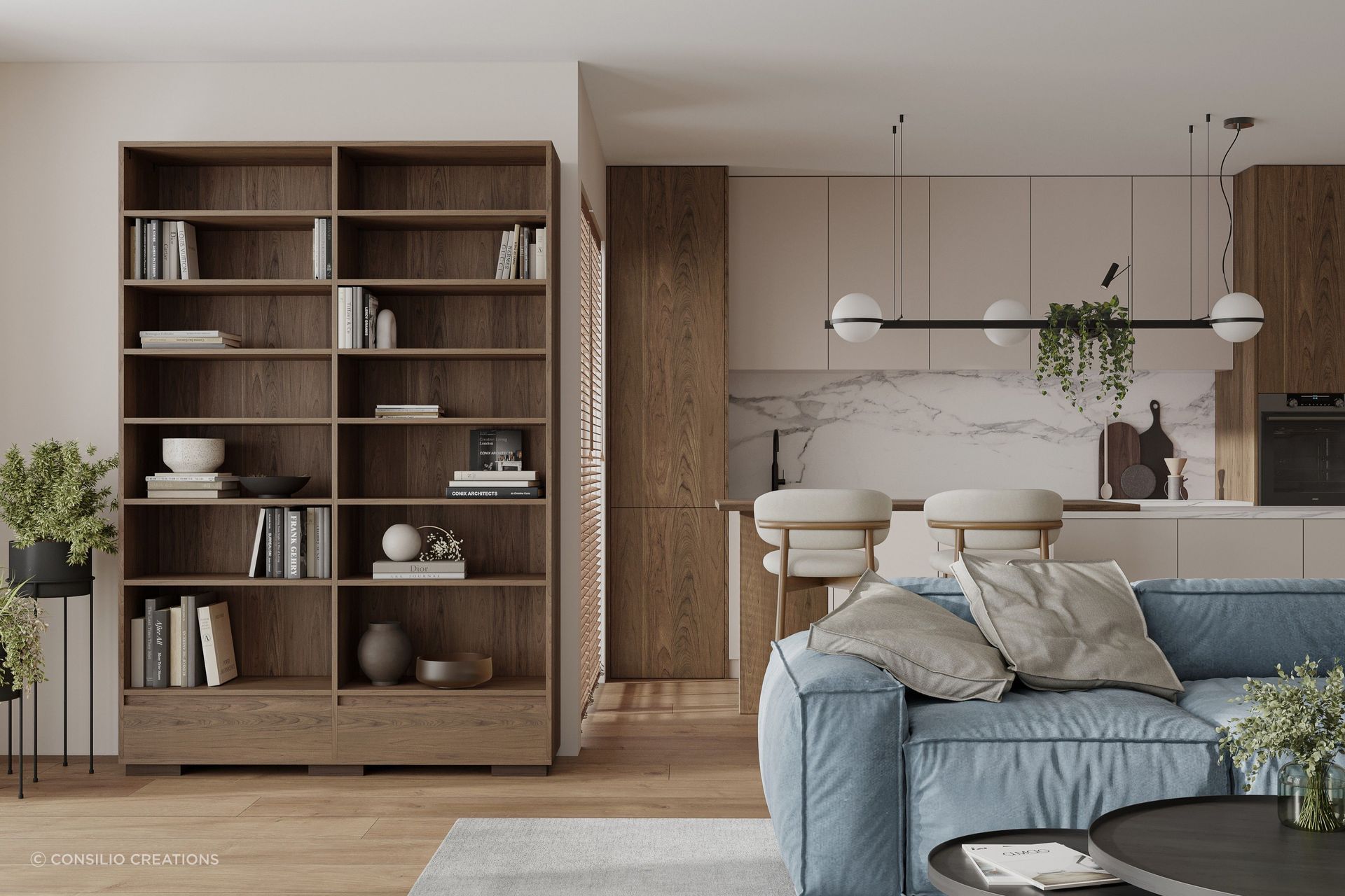 A mix of books, art and sculptural pieces imparts a pleasing balance in a space, as seen here with this bookcase by Consilio Creations.