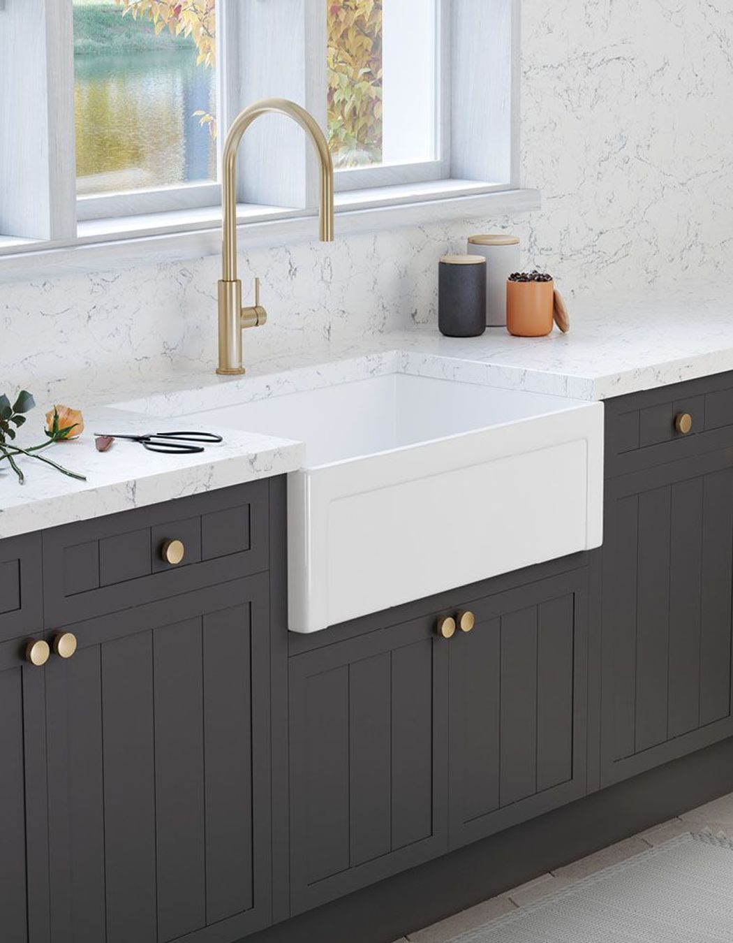 Farmhouse sinks, characterised by their exposed front apron, merge traditional charm with deep basins, making them both a stylistic statement and a practical choice for handling large kitchenware.