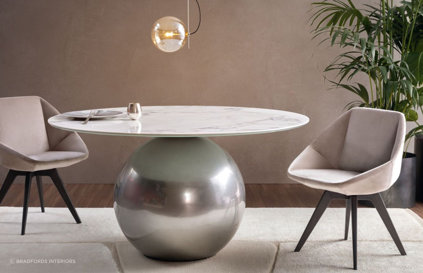 The combination of a spherical base and marble table top make for a compelling furnishing with the Circus Dining Table by Bonaldo.