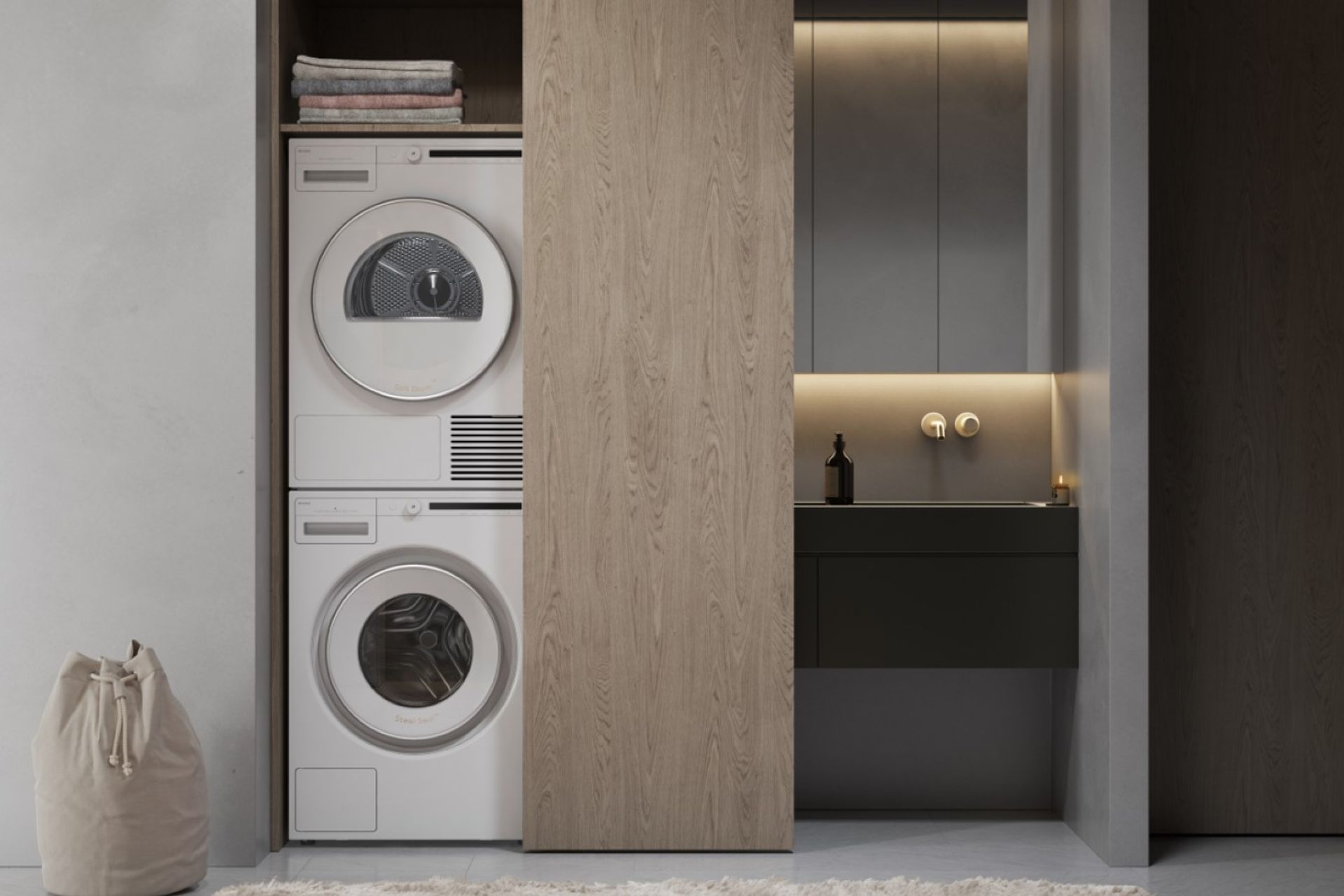 The Classic 8kg Dryer by ASKO, stacked here above a washing machine, is a fine example of a modern condenser dryer.