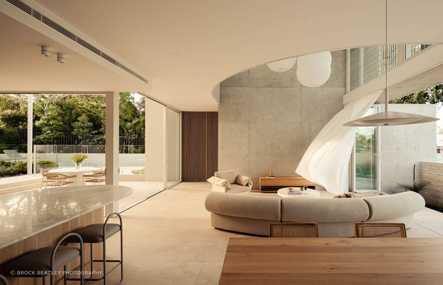 Bairndale Residence by Reitsma & Associates: Natural materials in both interior and exterior spaces create a direct connection with nature.