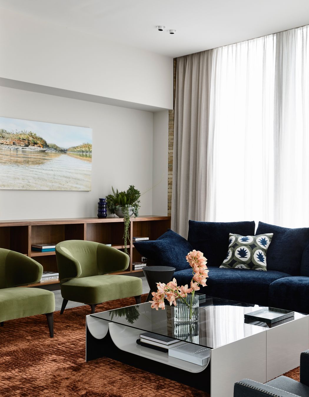 The living room of the Myvore House by AV-ID utilises robust materials to match styles common found in Brazil | Photography by Derek Swalwell