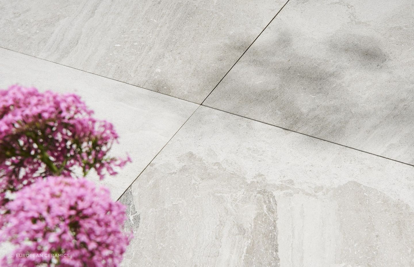 The exquisite natural veins of the Chinchilla Exterior Tile, made from a beautiful grey toned marble from Turkey.