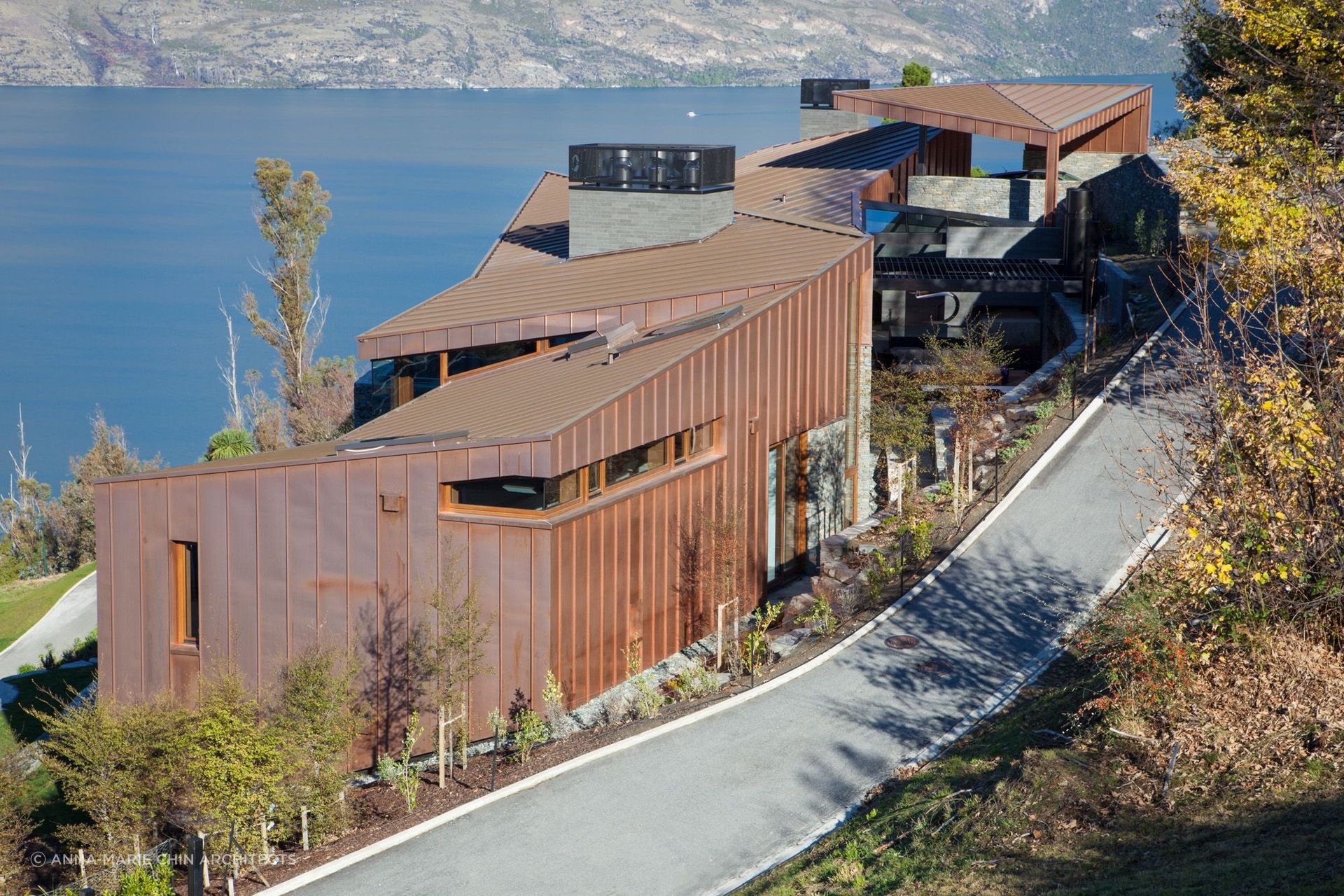Carved into the hillside, Copper House uses movement, shelter and shifting spatial experience to create a home that responds to both the drama of its site and the quiet needs of retreat.

Architecture: Anna-Marie Chin Architects