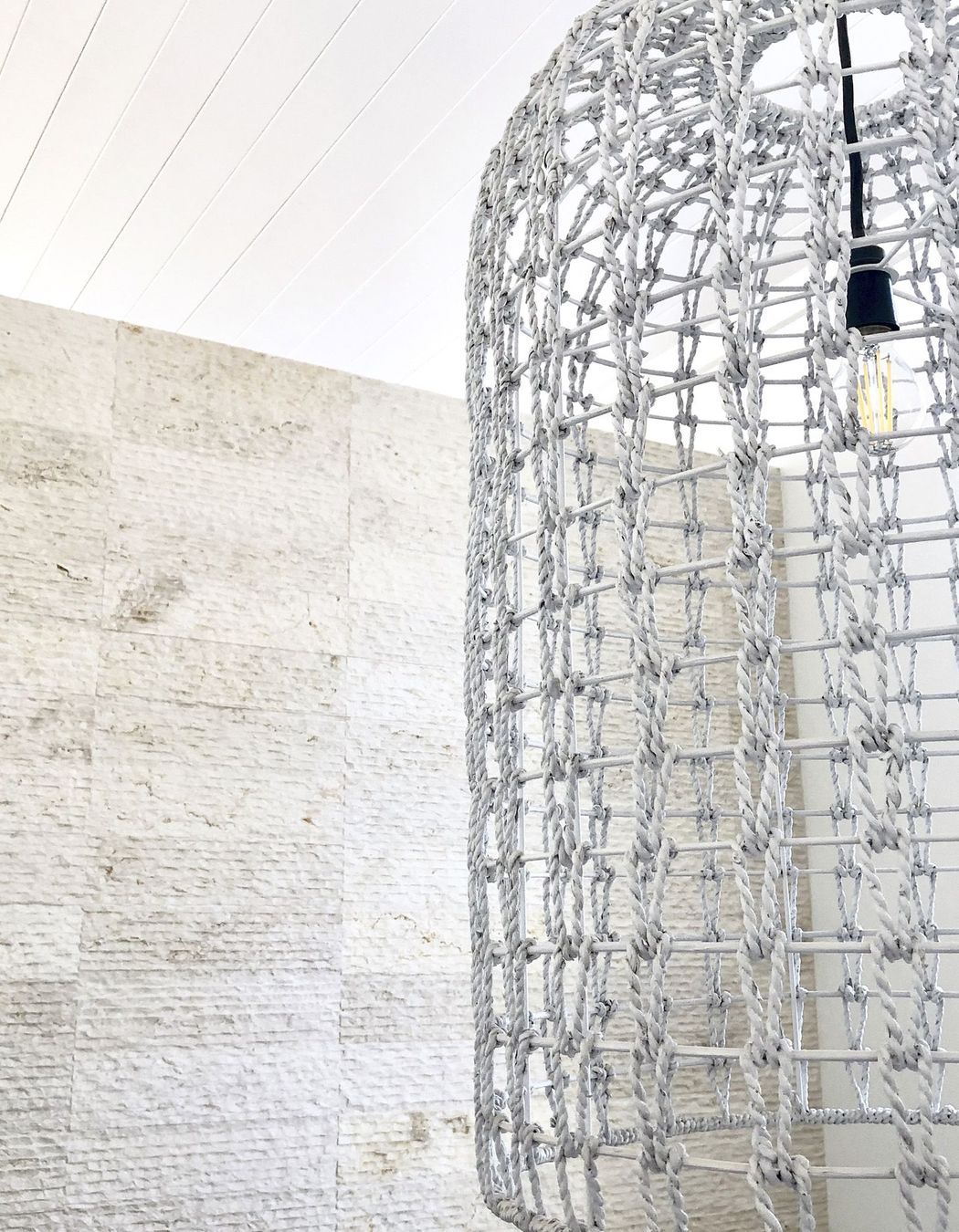 Cream wall cladding in action: modern aesthetic meets warm, soft-textured Crema Alpenia Limestone for an effortlessly contemporary look. Featured product: Cascade Cream Wall Cladding.