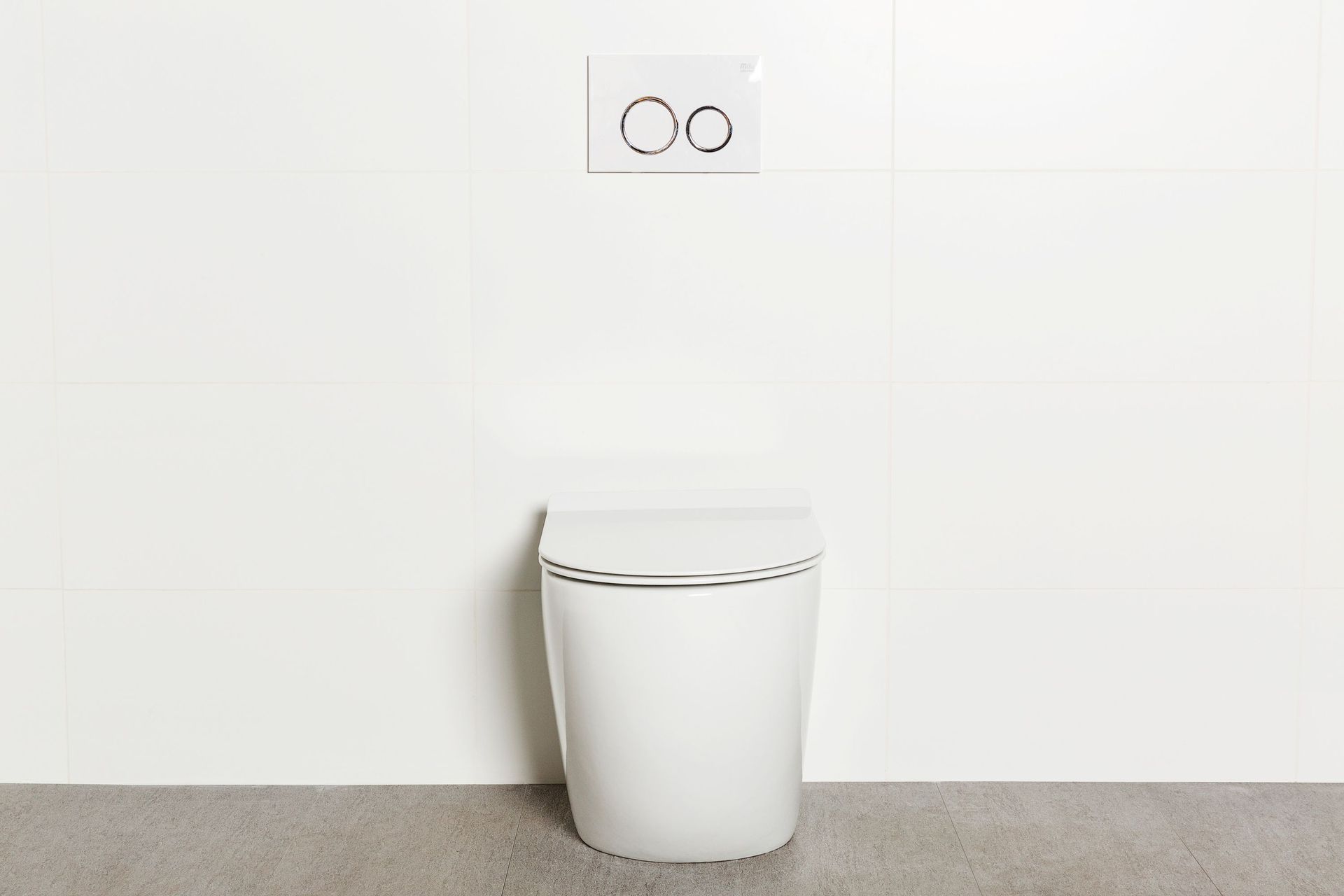 The Milu Odourless Floor Mount Toilet Pan & Cistern comes with a thin, soft-close seat.