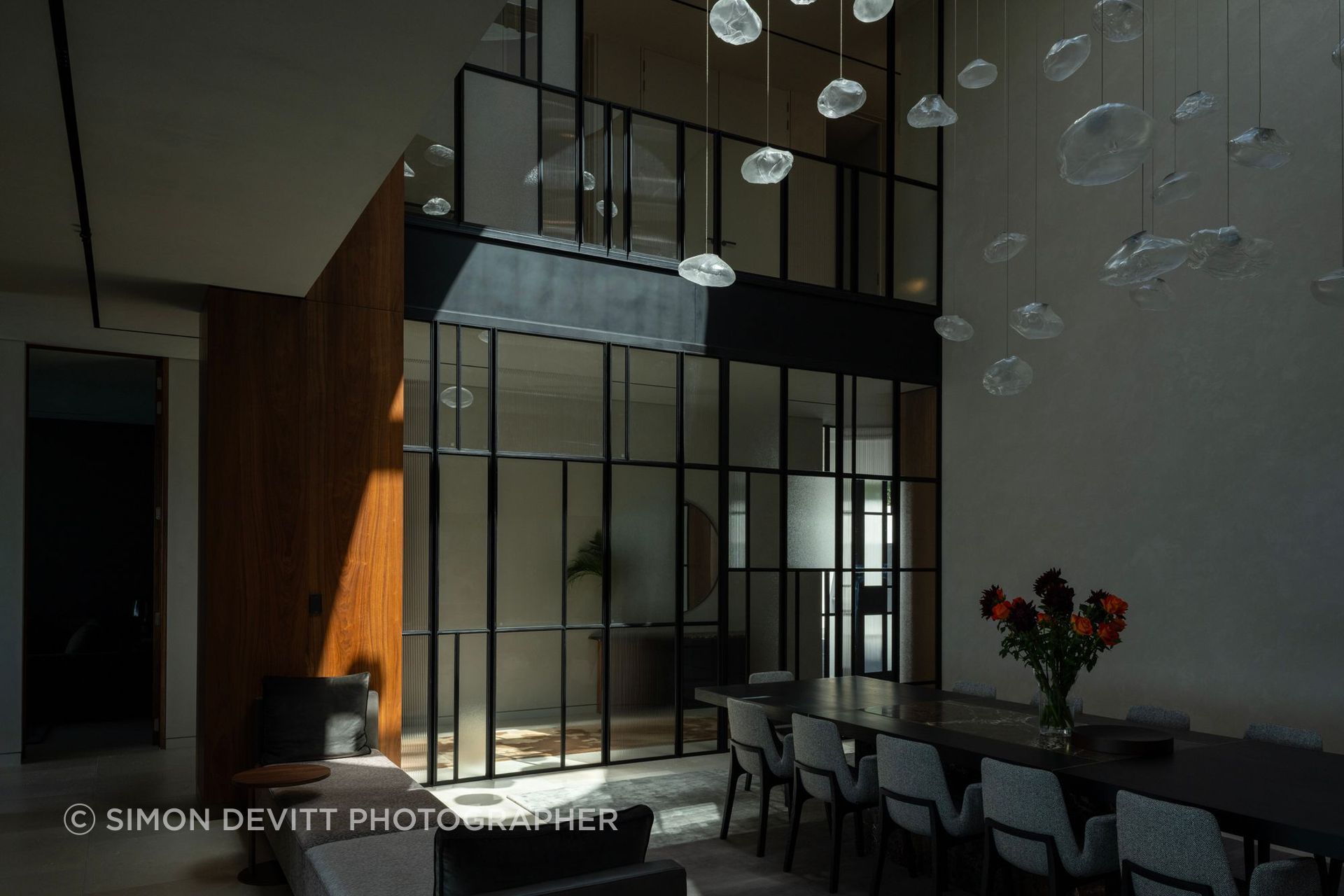Internal atria bring light into the depth of the plan, resolving the tension between privacy, density and the client’s desire for strong connections to the outdoors.