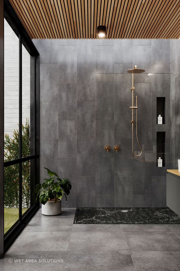 A stylish walk-in shower featuring a Custom Sized Solid Surface Shower Base from Wet Area Solutions (Aust) Pty Ltd.