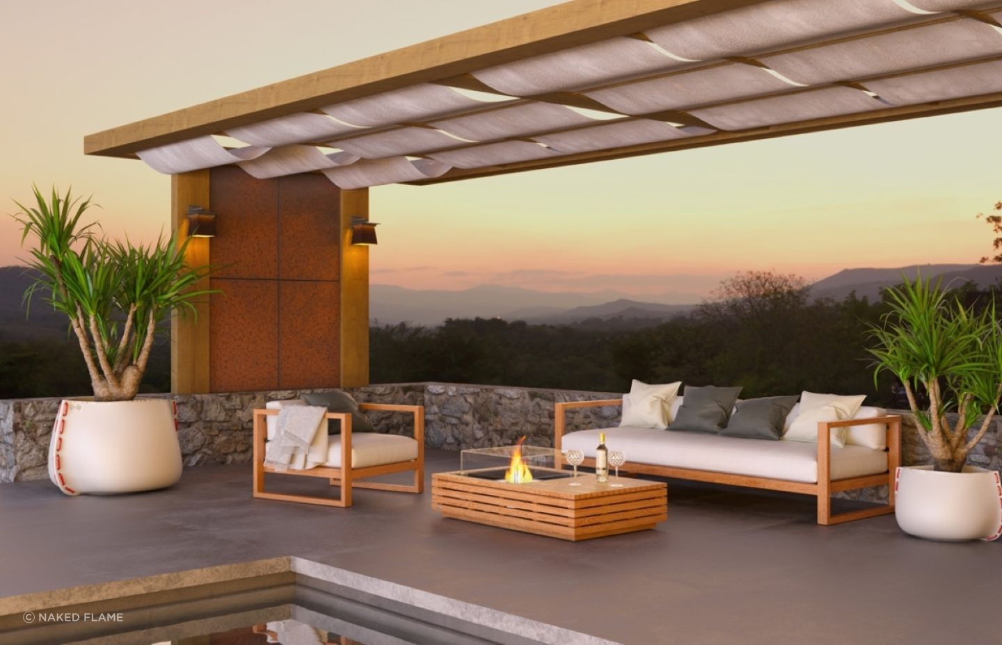 The teak finish of this EcoSmart Manhattan 50 Biofuel Fire gives great warmth to this outdoor space, complemented by matching outdoor furniture.