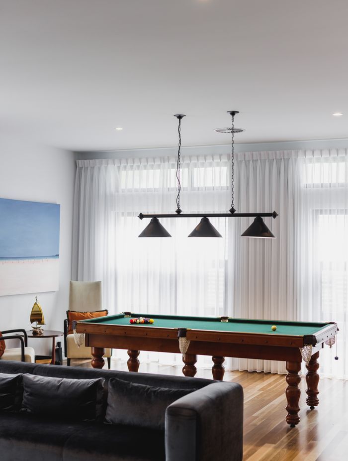 This games room by Black Lines Concept brings together the clients'  love of music and game playing.