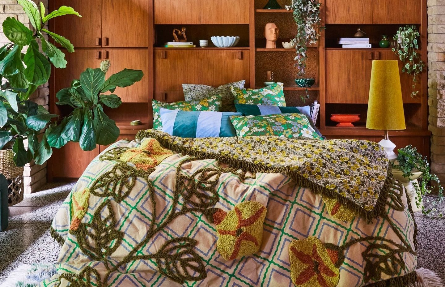 Potted plants can bring a tremendous feeling of vibrancy, especially when complemented by wonderful pieces like the Eloisa Tufted Blanket.