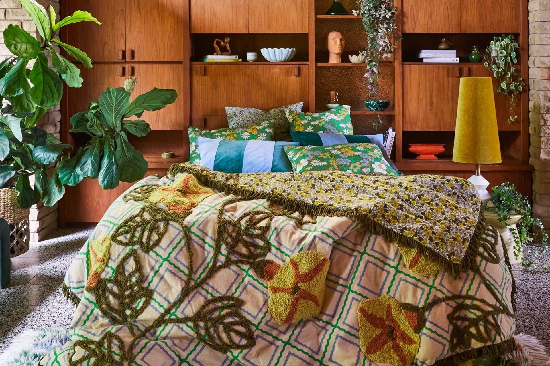 Potted plants can bring a tremendous feeling of vibrancy, especially when complemented by wonderful pieces like the Eloisa Tufted Blanket.