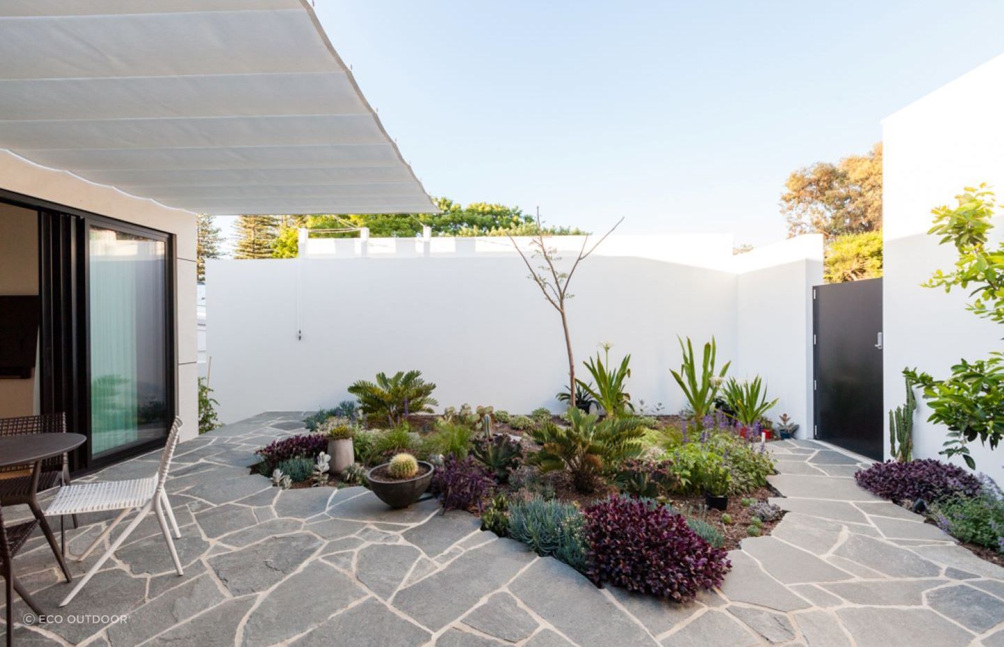 Flagstone options like these Eco Outdoor Split Stone Outdoor Pavers are great for complex layouts.