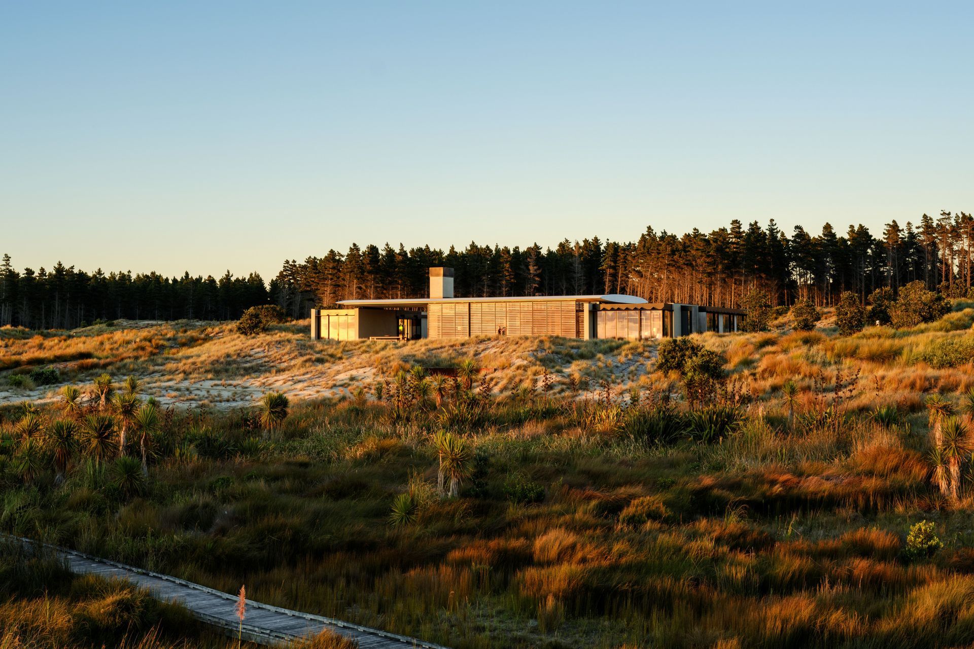 Te Whare Tupu Kirikiri at Tara iti by Olson Kundig Architects.