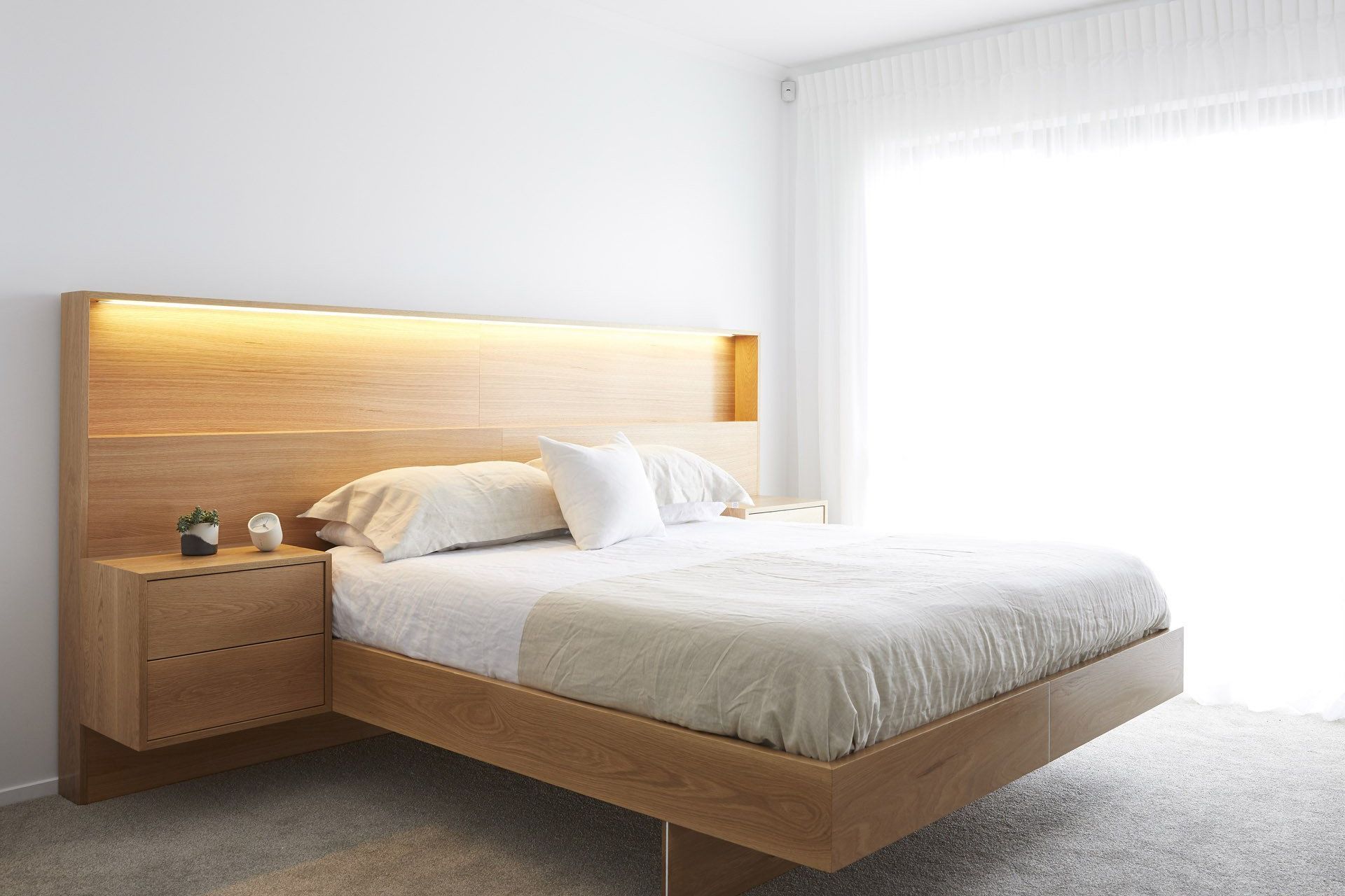 Minimalist styling and a clutter-free approach can really brighten a space up, as seen here with the immaculate Fenton Bed.