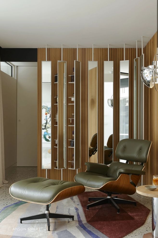 Reflection, light and spatial delineation is created by a mirror screen.