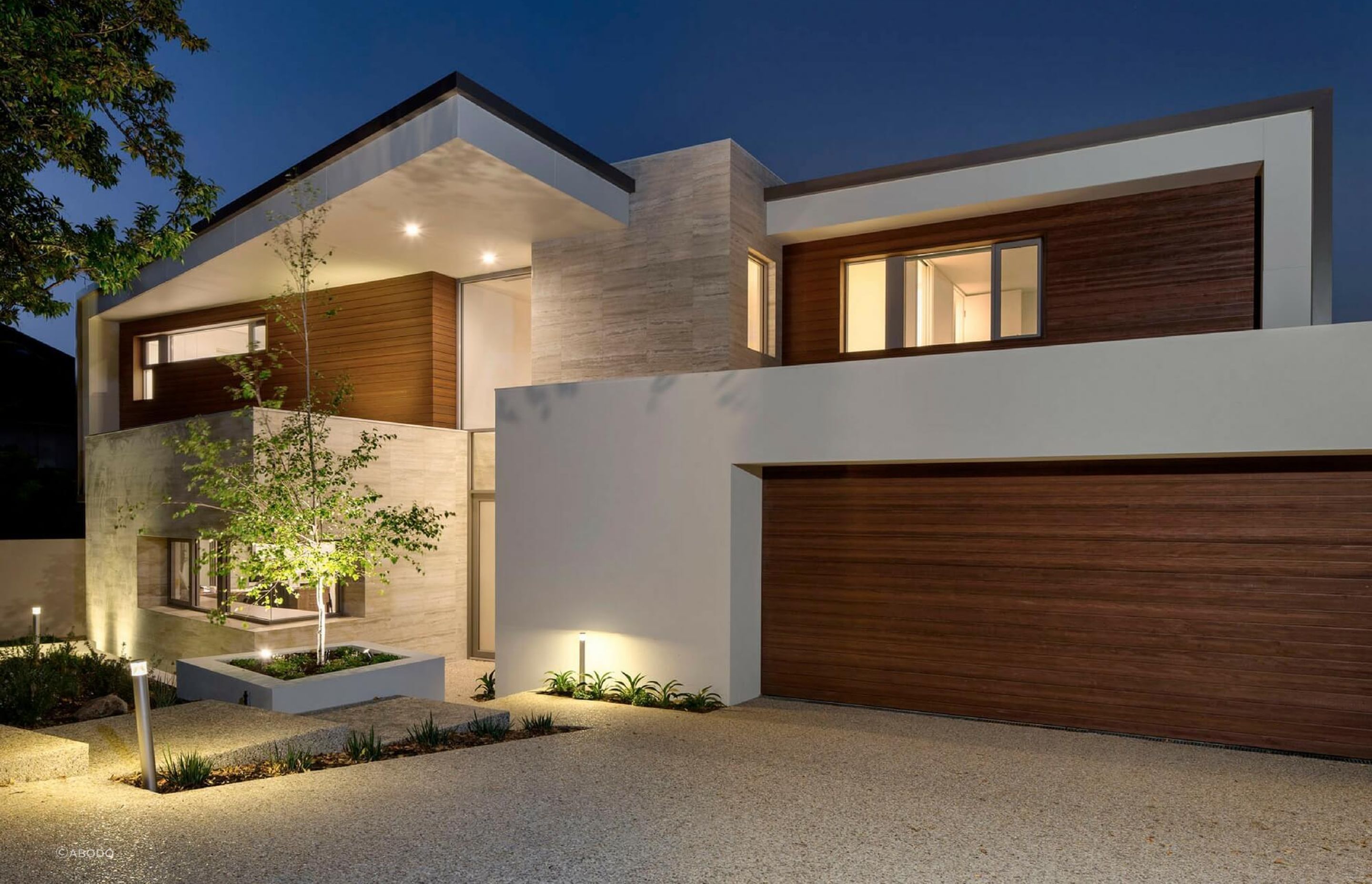 Timber weatherboards contrast nicely with the clean exterior of this house.