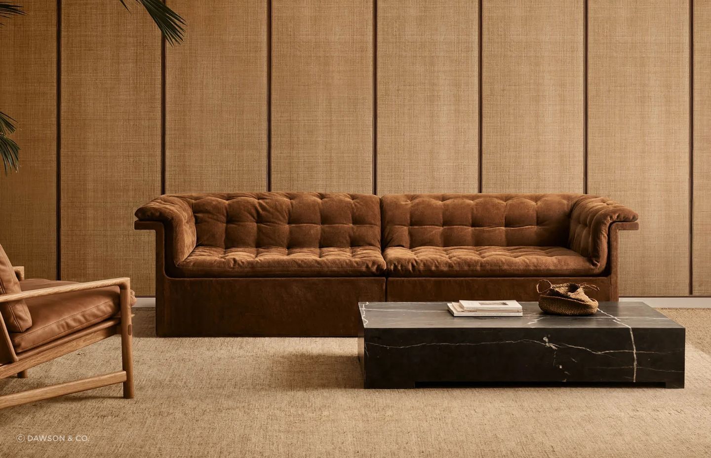 The Furrow Sofa from Dawson & Co. artfully combines the Chesterfield-inspired tufted motif with a sleek, contemporary form.