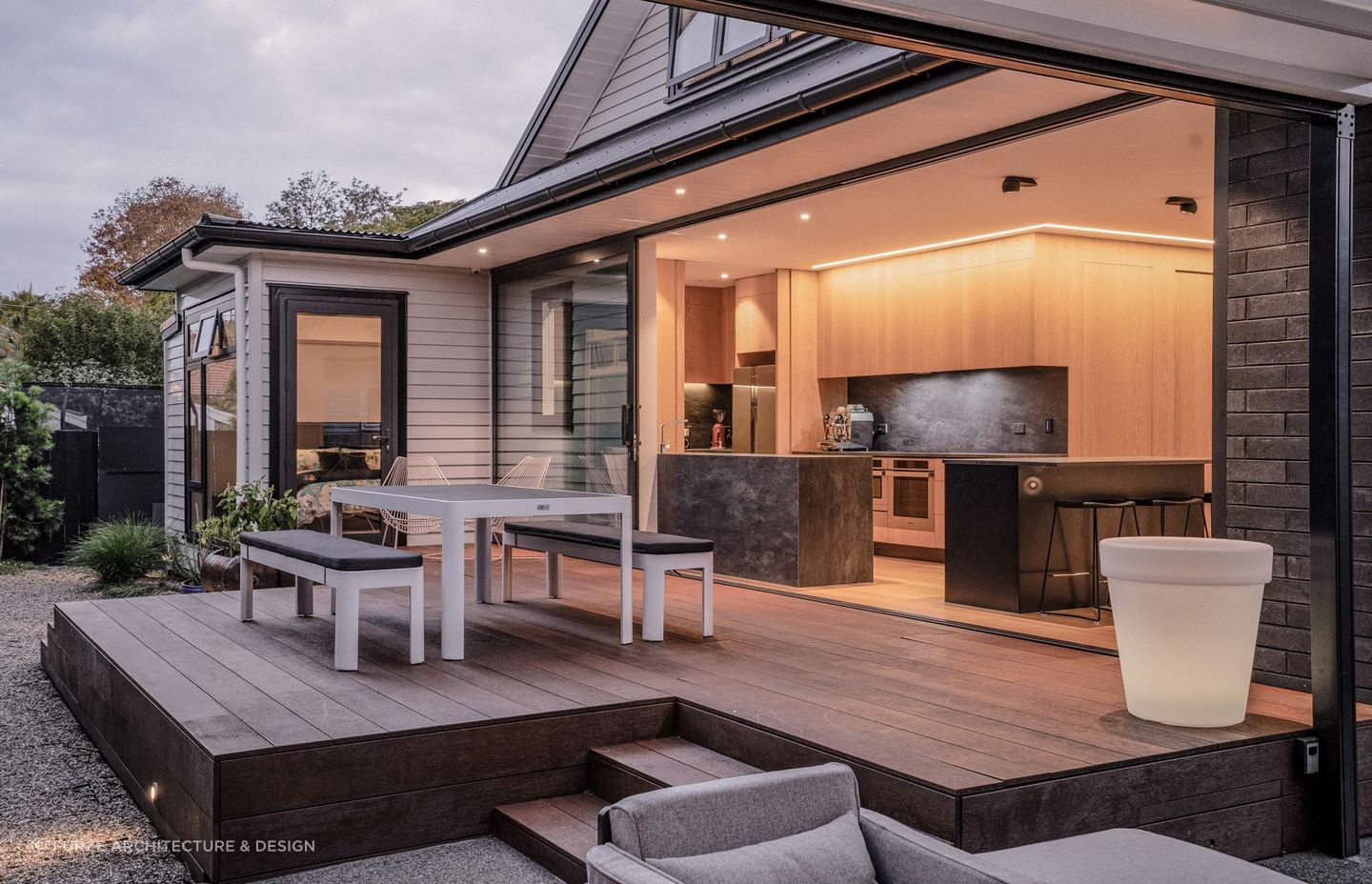 This porcelain stone splashback looks great from inside and outside the incredible Furze House.