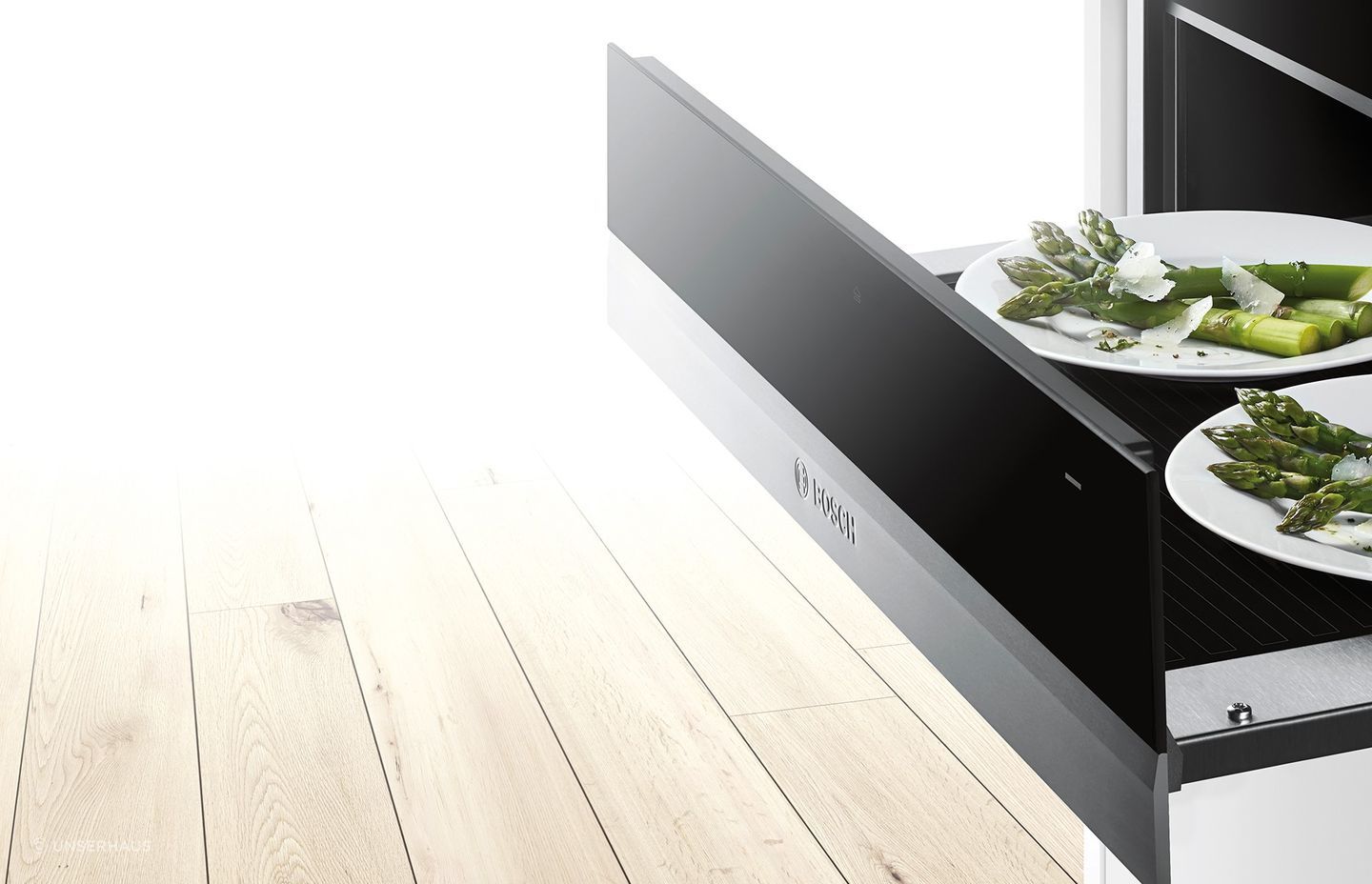 A warming drawer, like the stylish Bosch Series 8 Warming Drawer, is a unique but surprisingly handy addition to a modern kitchen.