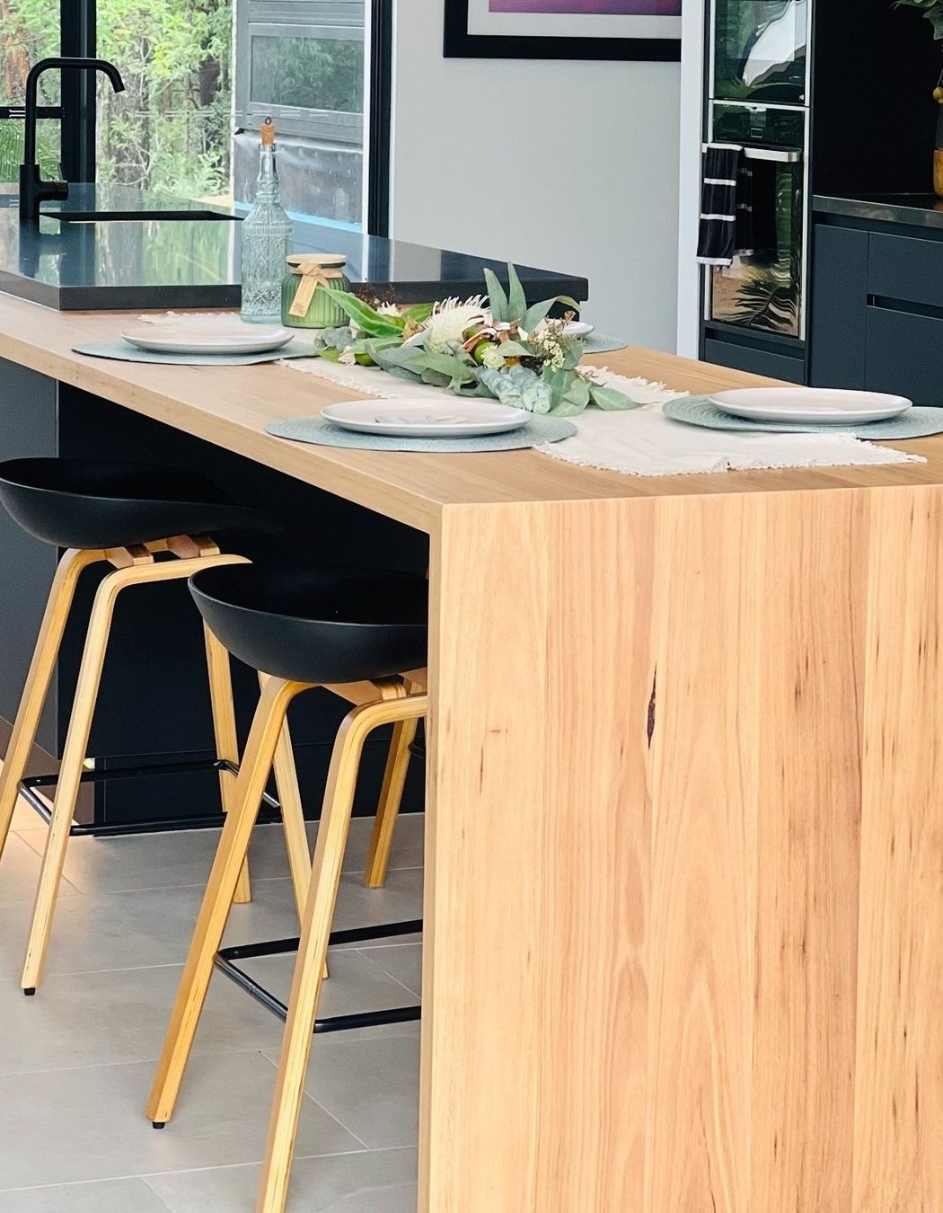 Stunning wooden benchtops like these Handcrafted Timber Benchtops by Revive Timber Designs bring instant warmth to a kitchen.