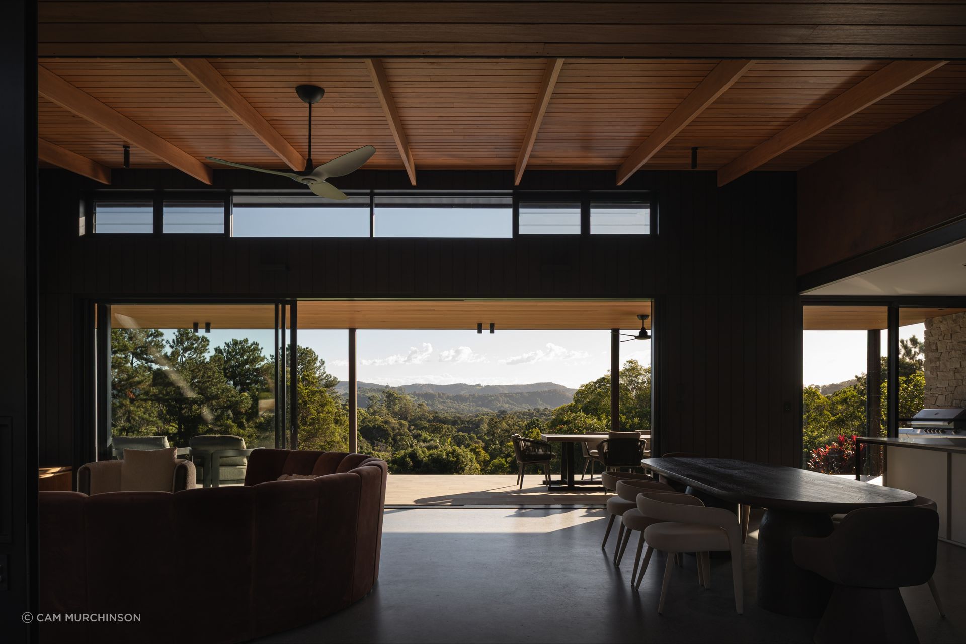 A palette of natural materials enhances a sense of serenity with the surroundings at Pomona House by Hive Architecture.
