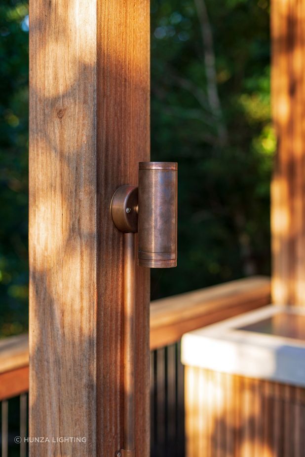 These solid brass pillar lights complement timber beams and pillars nicely.