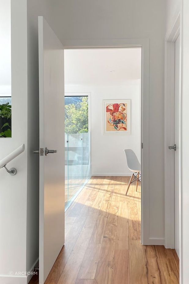 Rimu floors were chosen to soften the starkness of the white interior.