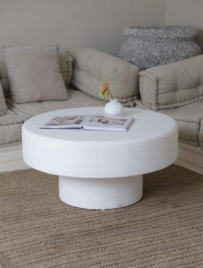 This Mediterranean coffee table has been handcrafted from a timber frame, coated with concrete, and finished in white matt paint. Featured product: Palma Coffee Table.