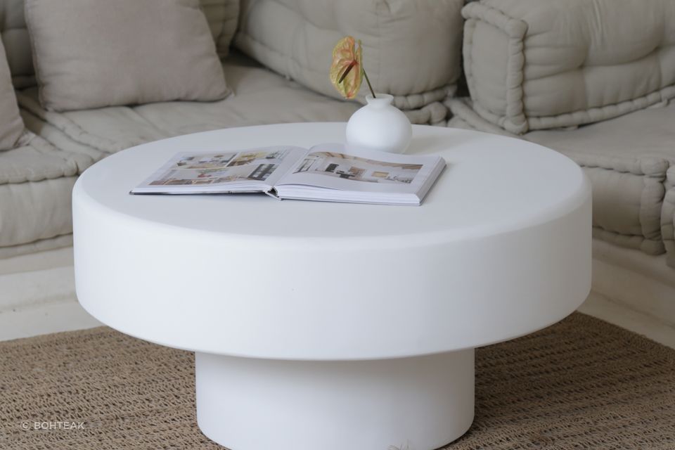 This Mediterranean coffee table has been handcrafted from a timber frame, coated with concrete, and finished in white matt paint. Featured product: Palma Coffee Table.