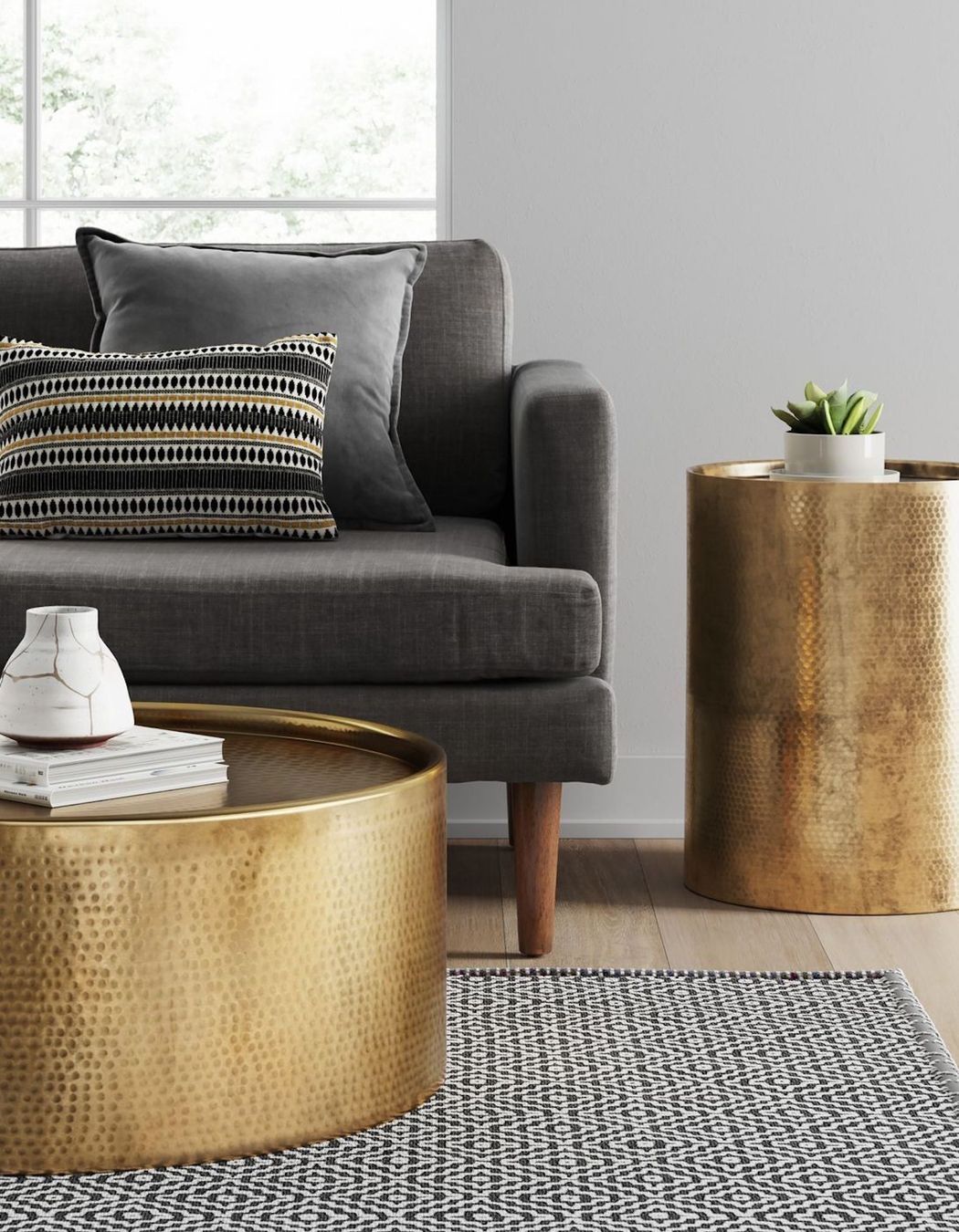 This intricately hammered barrel coffee table showcases a distinctive and elegant design.