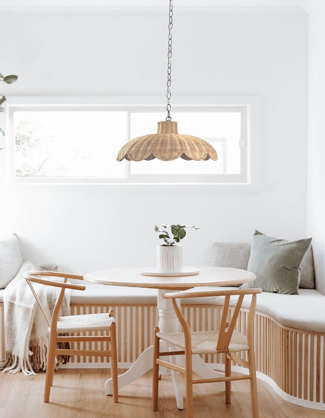 The Alice Scallop Rattan Pendant Light by Ivory & Deene has a relaxed and natural quality in design and texture.