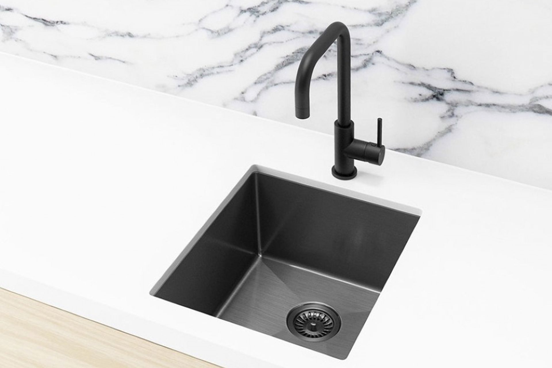 The Single Bowl Kitchen Sink in Gunmetal Black with undermount installation from Meir.