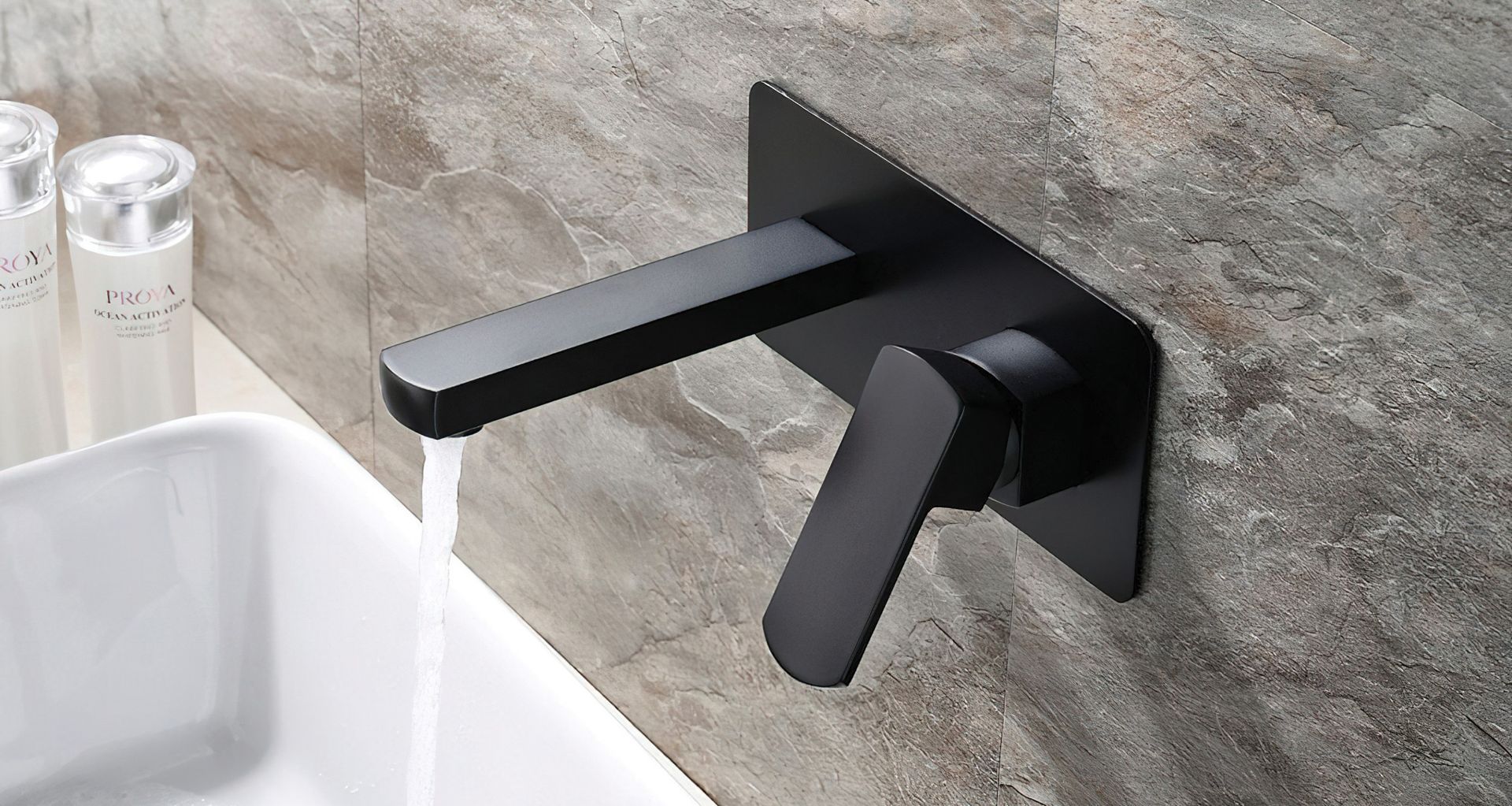 The Koko Wall Mixer with Spout in Matte Black.