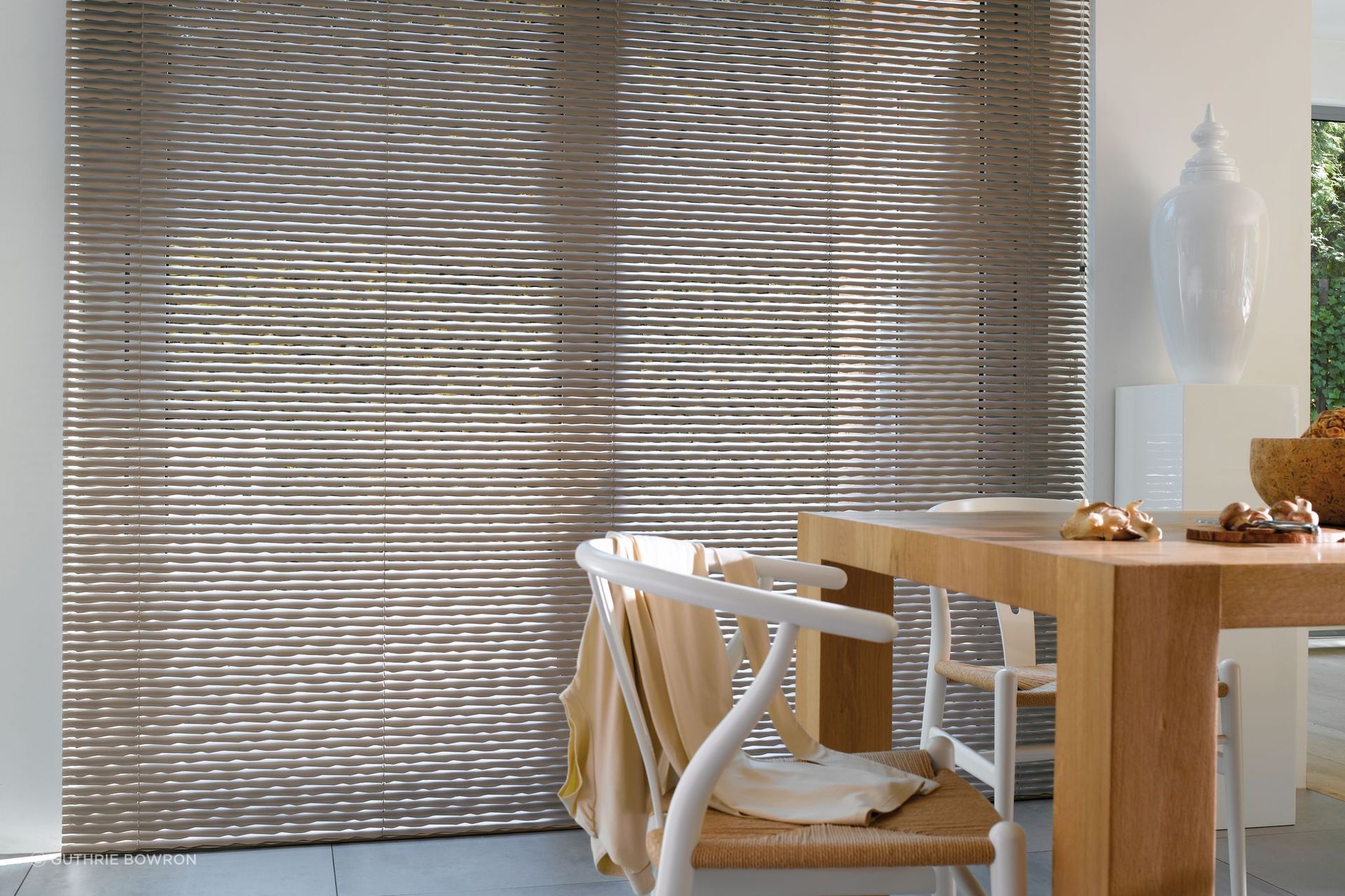 Venetian blinds come in a range of modern materials, as seen here with the LUXAFLEX® Aluminium Venetian Blinds by Guthrie Bowron.